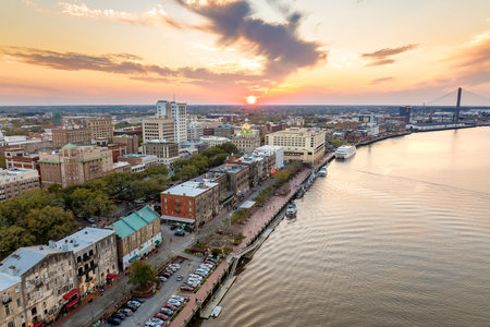 Aerial view of Savannah, old historical city in Georgia. River Street buildings architecture at nightの写真素材