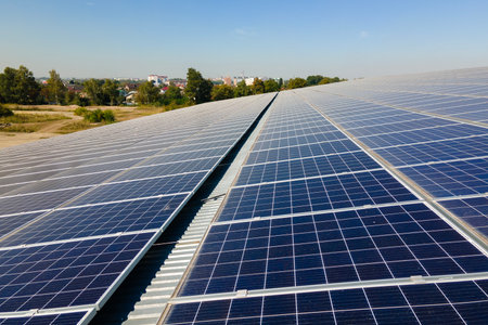 Autonomous building with photovoltaic rooftop covered with solar panels for producing of clean ecological electrical energyの写真素材