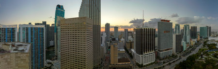 Evening urban landscape of downtown district of Miami Brickell in Florida, USA. Skyline with high skyscraper buildings and urban transportation system in modern american megapolisの写真素材