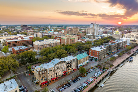 Famous River Street in historical Savannah, Georgia. Urban landscape of old historic city. USA cityscape at sunsetの写真素材
