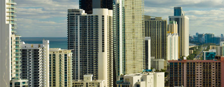 Expensive highrise hotels and condos on Atlantic ocean shore in Sunny Isles Beach city. American tourism infrastructure in southern Floridaの写真素材