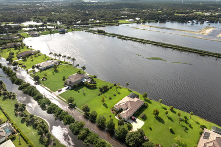 Flooded houses from hurricane rainfall water in Florida residential community. Aftermath of natural disaster in USA southの写真素材