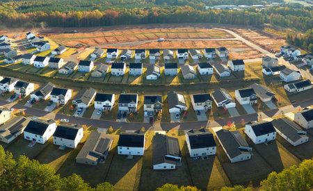 Ground prepared for building of new residential houses in South Carolina suburban development area. Concept of growing american suburbsの写真素材
