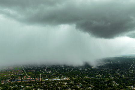 Heavy rainfall over Florida suburbs during summer thunderstormの写真素材