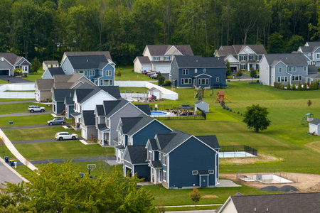 Residential homes in suburban sprawl development in Rochester, New York. Low-density two story private houses in rural suburbs. Housing market in the USAの写真素材