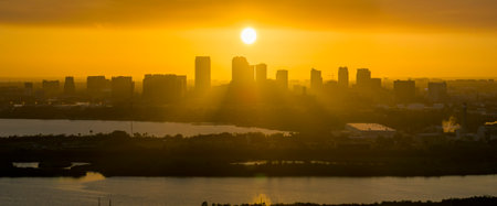 Urban sunset landscape of downtown district of Tampa city in Florida, USA. Dramatic skyline with high skyscraper buildings in modern american megapolisの写真素材