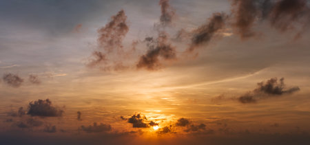 Amazing evening skyscape. Sunset sky with bright colorful cloudsの写真素材