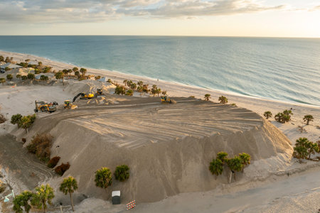 Piles of sand at Charlotte County sand recipient site at Englewood Beach on Manasota Key as hurricane Milton aftermath cleanupの写真素材