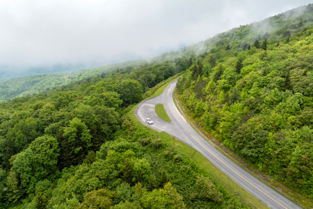 Landscape of beautiful nature. Blue Ridge Parkway road trip. Overlook parking place in Appalachian mountains landscape. Driving car exploration travel in summer forest in North Carolinaの写真素材