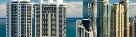 Expensive highrise hotels and condos on Atlantic ocean shore in Sunny Isles Beach city. American tourism infrastructure in southern Floridaの写真素材