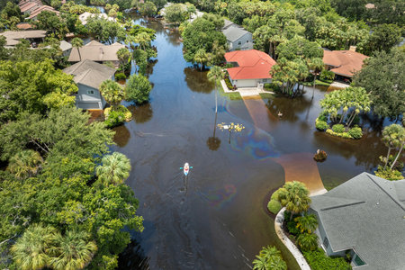 Flooded houses from hurricane Debby rainfall water in residential community in Sarasota, Florida. Aftermath of natural disaster in USA southの写真素材