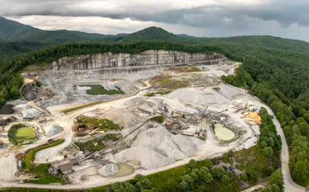 Sand open-pit mining quarry with processing plant for crushed stone. Extracting of natural resources for construction industryの写真素材
