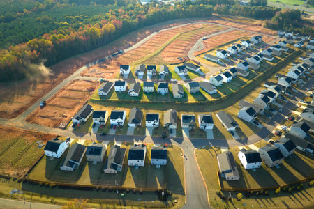 Aerial view of construction site with new tightly packed homes in South Carolina. Family houses as example of real estate development in american suburbsの写真素材