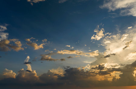 Amazing evening skyscape. Sunset sky with bright colorful cloudsの写真素材