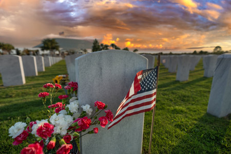 American army Sarasota National Cemetery with rows of white tombstones with USA flags and flowers. Memorial Day conceptの写真素材