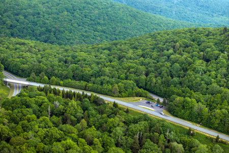 Beacon Heights parking lot overlook on Blue Ridge Parkway road in summer woods of Appalachian mountains. Road trip driving in wild nature in summertime seasonの写真素材