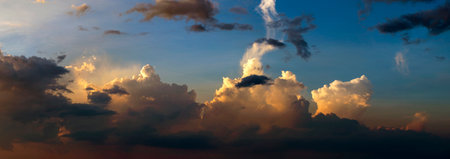 Evening sunset sky with colorful clouds. Panoramic skyscapeの写真素材