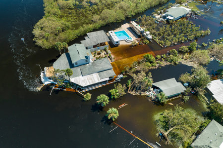 Aftermath of natural disaster. Flooded houses by hurricane Ian rainfall in Florida residential areaの写真素材
