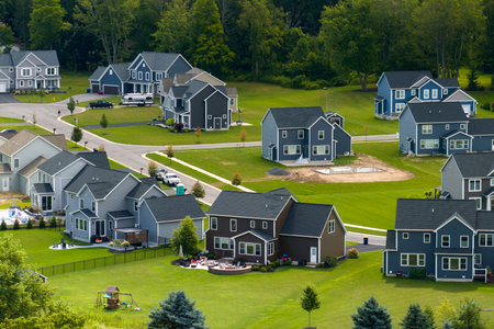 American dream homes as example of real estate development in US suburbs. View from above of residential houses in living area in Rochester, NYの写真素材
