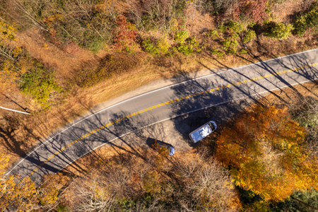 Car road trip on Blue Ridge Parkway in North Carolina Appalachian mountains in fall season. Autumnal landscape of beautiful natureの写真素材