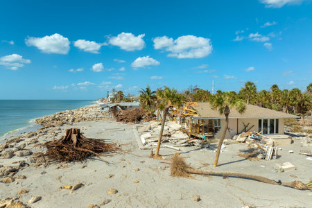 Hurricane Milton consequences on Manasota Key, Florida. Destroyed houses on sea coast. Storm surge severe damageの写真素材