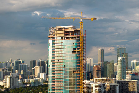Skyscraper construction in Miami, Florida. USA real estate development. Big city urban landscape with high-rise buildingsの写真素材