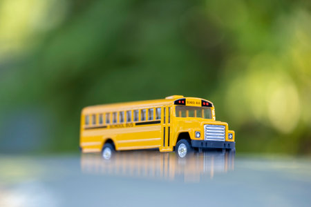 Toy american yellow school bus as symbol of education in the USAの写真素材