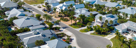 American dream homes on rural cul-de-sac street in US suburbs. Residential houses in living area in...