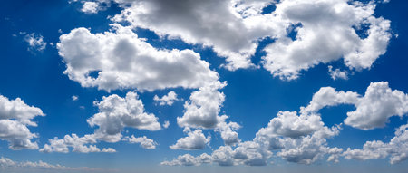 Florida weather. Blue sky with white summer rain clouds. Colorful summer landscapeの写真素材