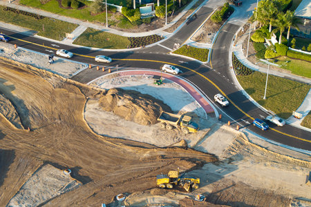 Roundabout construction roadworks on American transport infrastructure. Renovation of highway road...