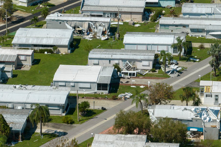 Consequences of natural disaster in southern Florida after hurricane season. Severely damaged houses...
