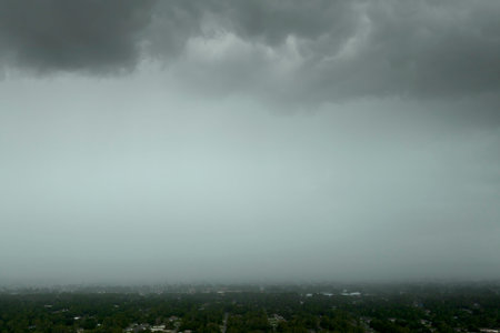 Heavy rainfall over Florida suburbs during summer thunderstorm.の写真素材