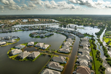 Hurricane Debby tropical rainstorm flooded residential homes in suburban community in Sarasota, Florida. Aftermath of natural disasterの写真素材