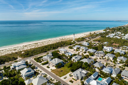 Large residential homes in island small town Boca Grande on Gasparilla Island in southwest Florida. American waterfront houses in rural US suburbsの写真素材