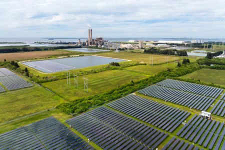 Transition from fossil to sustainable fuel for electrical energy production. Solar photovoltaic panels at Big Bend Power Station in Apollo Beach near Tampa, Floridaの写真素材
