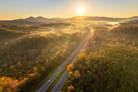 American highway in North Carolina Appalachian mountains in fall season with fast moving traffic. Interstate transportation conceptの写真素材