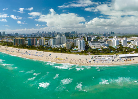 American southern seashore of Miami Beach city. Tourist infrastructure in Florida, USA. South Beach high luxurious hotels and apartment buildingsの写真素材