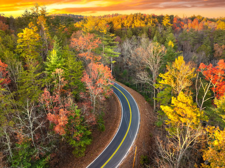Blue Ridge Parkway in autumn. Mountain pass road between dense woods in seasonal colors in North Carolinaの写真素材