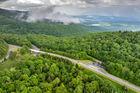 Car road trip on Blue Ridge Parkway in North Carolina Appalachian mountains. Beacon Heights parking lot overlook in summer season. Summertime landscape of beautiful natureの写真素材