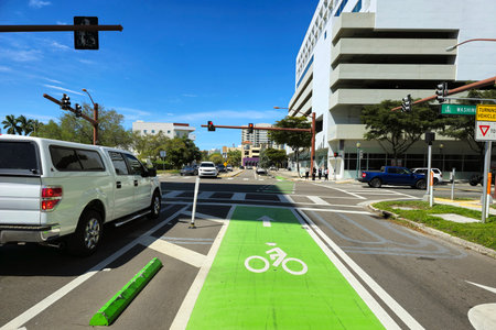 Cycling lane on Sarasota city road supporting safe biking in Florida urban environmentの写真素材