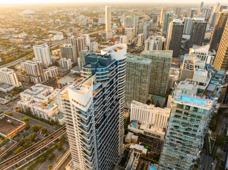 Downtown district of Miami in Florida, USA. Urban landscape of high skyscraper buildings in modern American city at sunsetの写真素材