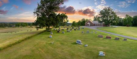 Grave tombstones at old cemetery in small town America. Death conceptの写真素材