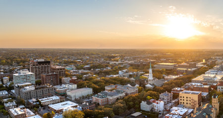 Historical American city architecture at night. Savannah, old city in Georgia state. Illuminated streets and buildings from aboveの写真素材