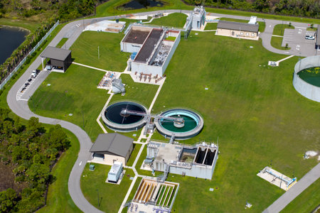 Industrial water treatment facility with water cleaning cisterns and piping systemの写真素材