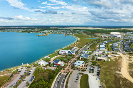 Photovoltaic panels on solar rooftops of Florida commercial buildings for producing clean ecological electrical energy. Renewable electricity with zero emission conceptの写真素材
