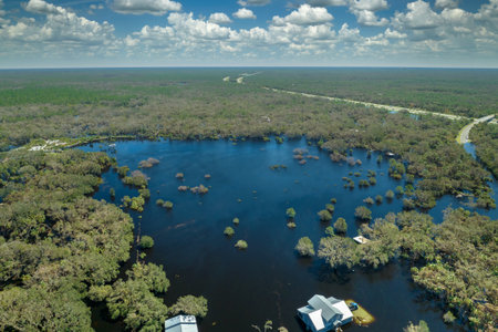 Surrounded by hurricane Ian rainfall flood waters homes in Florida residential area. Aftermath of natural disasterの写真素材