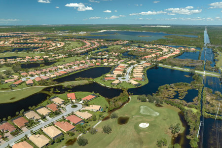 Surrounded by hurricane Ian rainfall flood waters homes in Florida residential area. Aftermath of natural disasterの写真素材