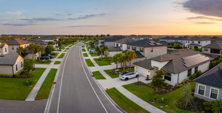 Wealthy residential area in USA suburbs. Rich neighborhood with expensive suburban homes in southwest Floridaの写真素材