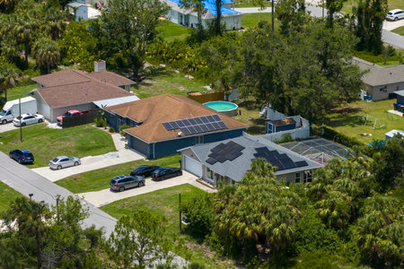 Solar photovoltaic panels mounted on house roof for producing clean ecological electric energy....