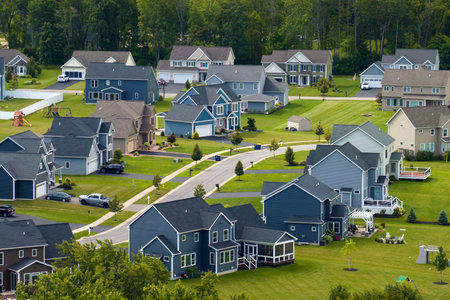 Aerial view of private residential houses in rural suburban sprawl area in Rochester, New York....
